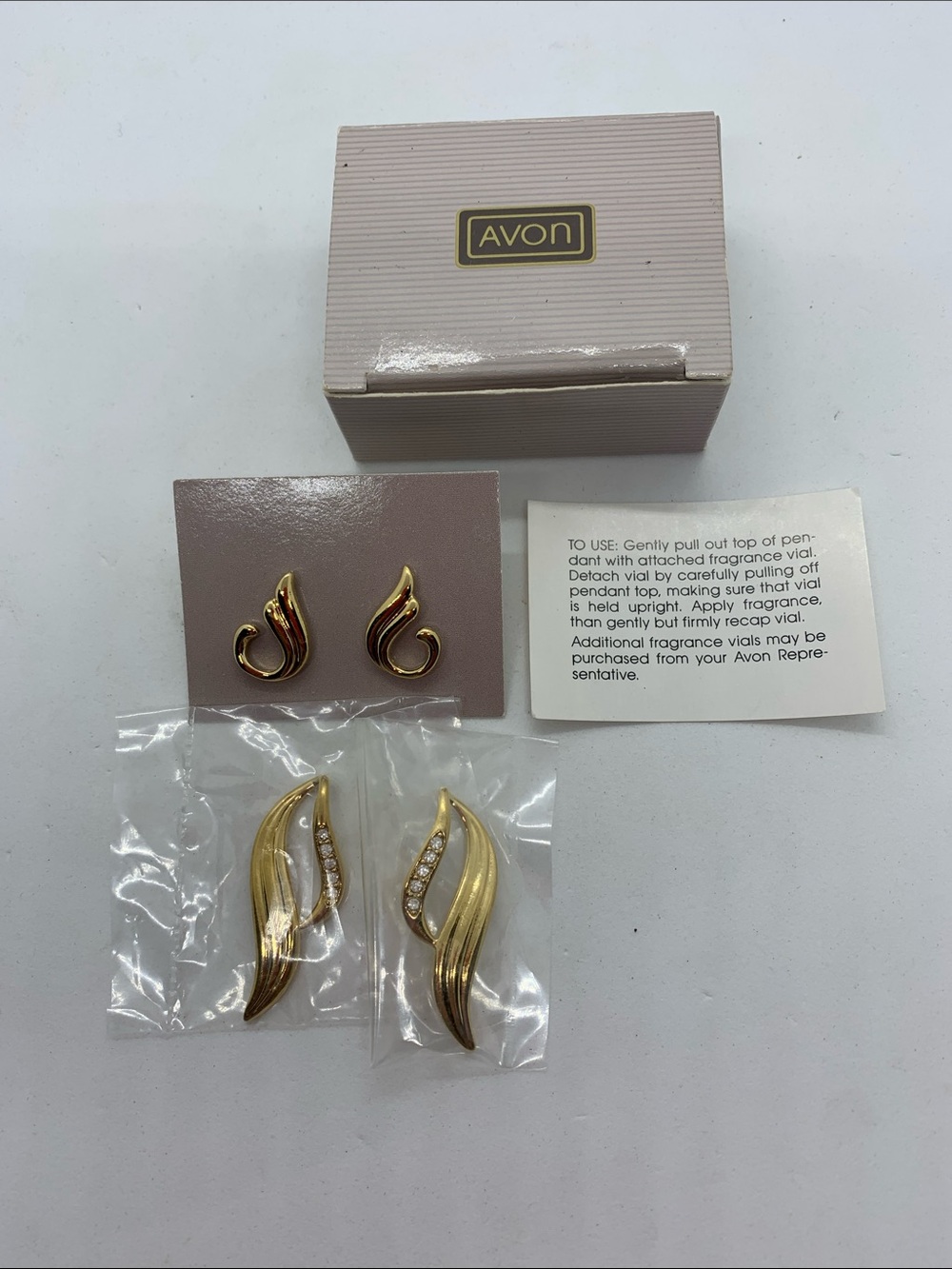 Avon Day Into Evening Gold Tone Swirl Pierced Earrings Set